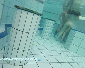 NEW! A pretty young couple playing in the water and I think she wants to do a lot more