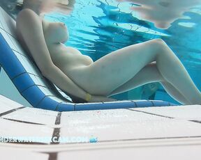 NEW! This horny girl with the great tits gets horny and starts to masturbate with the underwater jets of the lounger