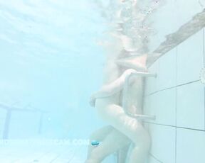 NEW! These couples obviously have experience in performing sexual acts in the pool without attracting attention