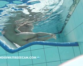 NEW! This hot Latina shows off her fantastic body on an underwater lounger.