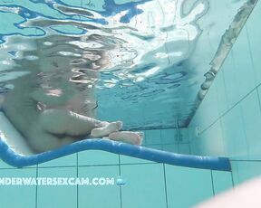 NEW! This hot Latina shows off her fantastic body on an underwater lounger.