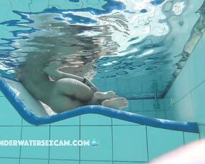 NEW! This hot Latina shows off her fantastic body on an underwater lounger.