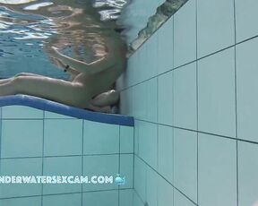 NEW! This hot Latina shows off her fantastic body on an underwater lounger.
