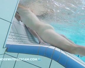 NEW! Looks like she's really fucking the jets of the underwater lounger.