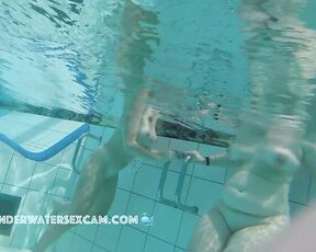 NEW! This pretty woman had breast augmentation surgery and is enjoying an underwater massage.