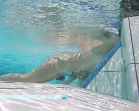 NEW! This horny MILF with beautifully enhanced breasts masturbates shamelessly with underwater jets.