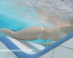 NEW! This horny MILF with beautifully enhanced breasts masturbates shamelessly with underwater jets.
