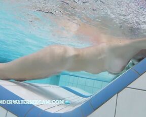 NEW! This horny MILF with beautifully enhanced breasts masturbates shamelessly with underwater jets.