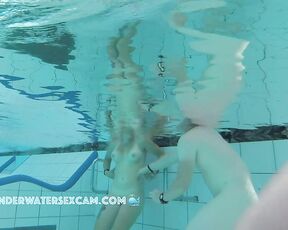 NEW! A young couple has found the powerful underwater jets and is enjoying a massage.