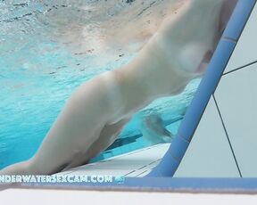 NEW! First she looks me in the eyes and then at my dick while she continues to masturbate.