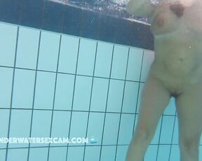 NEW! This busty MILF enjoys an underwater massage with jets.
