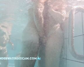 NEW! Cute young couple gets horny with each other in the sauna pool while the voyeur watches