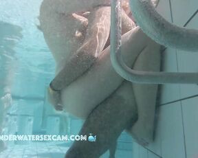 NEW! Cute young couple gets horny with each other in the sauna pool while the voyeur watches