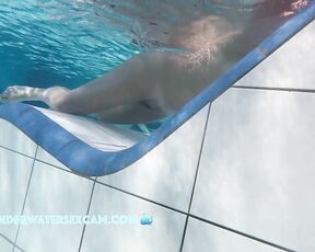 NEW! This lady is really enjoying the underwater jets built into the lounger.
