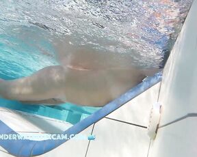 NEW! This lady is really enjoying the underwater jets built into the lounger.