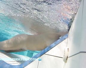 NEW! This lady is really enjoying the underwater jets built into the lounger.