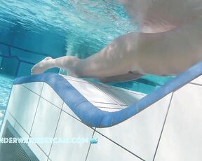NEW! This lady is really enjoying the underwater jets built into the lounger.
