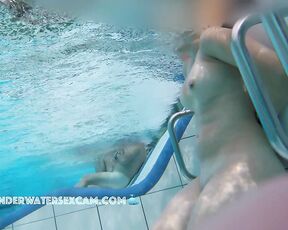 While she watches the other naked visitors closely, her nipples get hard and so does my prick.