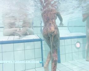 NEW! She looks like she's wearing a swimsuit, but she's completely naked.
