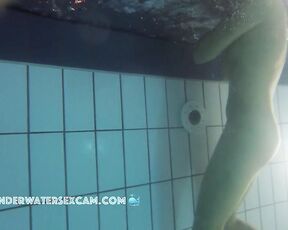 NEW! A beautiful young girl with small breasts and nipples enjoys the warm water in the sauna pool.