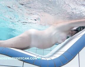 NEW! This lady is clearly enjoying the massage on her breasts, stomach, and pussy.