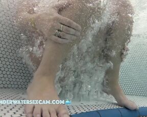 NEW! This girl is very close to me and is having fun with the bubbles in the jacuzzi.
