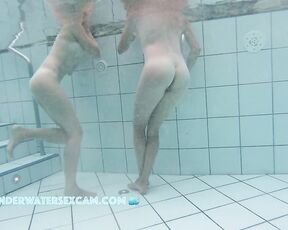 NEW! Two hot ladies love showing off their beautiful bodies in the sauna pool.