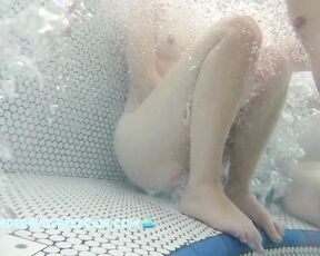 NEW! Young couple playing in the jacuzzi and she definitely gets horny doing it