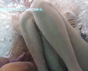 NEW! She gets totally horny and jerks him off and feels his bulging balls in the jacuzzi.