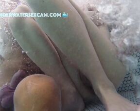 NEW! She gets totally horny and jerks him off and feels his bulging balls in the jacuzzi.