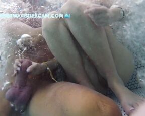 NEW! She gets totally horny and jerks him off and feels his bulging balls in the jacuzzi.