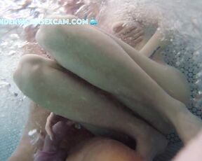 NEW! She gets totally horny and jerks him off and feels his bulging balls in the jacuzzi.