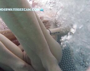 NEW! She gets totally horny and jerks him off and feels his bulging balls in the jacuzzi.