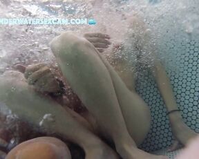 NEW! She gets totally horny and jerks him off and feels his bulging balls in the jacuzzi.