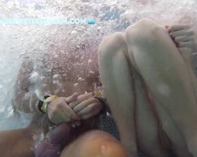 NEW! She gets totally horny and jerks him off and feels his bulging balls in the jacuzzi.