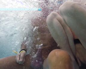 NEW! She gets totally horny and jerks him off and feels his bulging balls in the jacuzzi.