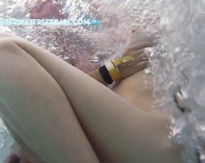 NEW! She gets totally horny and jerks him off and feels his bulging balls in the jacuzzi.