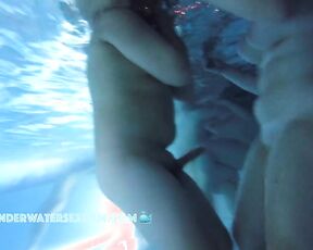 NEW! This young couple plays underwater with his erection and has fun doing it.