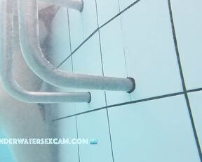 NEW! This girl isn't very tall, but she's totally hot because she's playing naked in the warm water of the sauna pool.