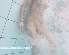 NEW! This horny MILF enjoys getting a little massage and looks at all the dicks around her while she does it.