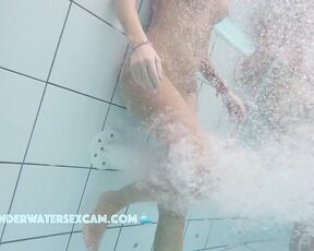 NEW! This horny MILF enjoys getting a little massage and looks at all the dicks around her while she does it.