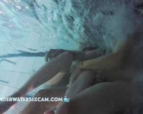 NEW! The girl is so horny in the pool! She kindly gives him a hand job but keeps fingering herself.