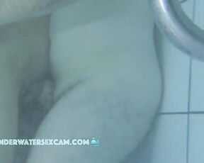 NEW! And again, couples getting horny because they're standing naked in the warm pool watching other people.