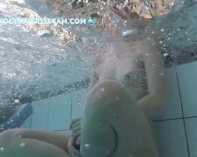 NEW! I can see that this pretty young woman is horny because she has been touching her breasts several times.