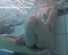 NEW! I can see that this pretty young woman is horny because she has been touching her breasts several times.