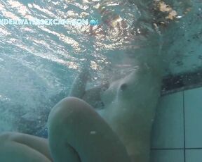 NEW! I can see that this pretty young woman is horny because she has been touching her breasts several times.