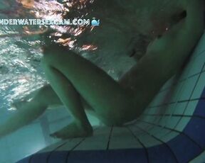 NEW! This girl is surprised by the underwater jets in the lounger, but then she realizes what she can do with them.