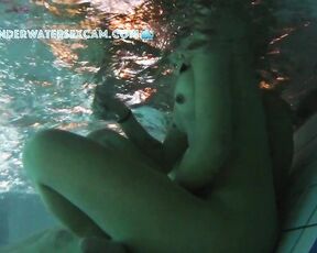 NEW! This girl is surprised by the underwater jets in the lounger, but then she realizes what she can do with them.