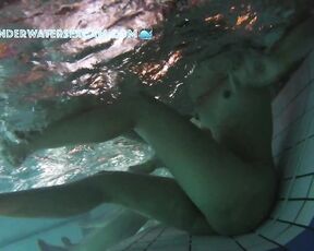 NEW! This girl is surprised by the underwater jets in the lounger, but then she realizes what she can do with them.