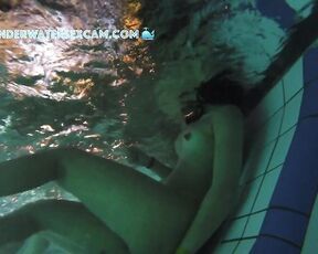 NEW! This girl is surprised by the underwater jets in the lounger, but then she realizes what she can do with them.